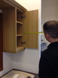 Measuring hinge position on back of kitchen cupboard door