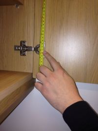 Measuring kitchen door hinge position from top of door